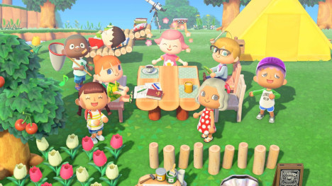 Group of Villagers around a picnic table